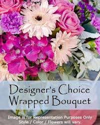 Wrapped bouquet Designers Choice with Some Roses